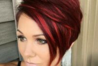 pixie cut with red highlights